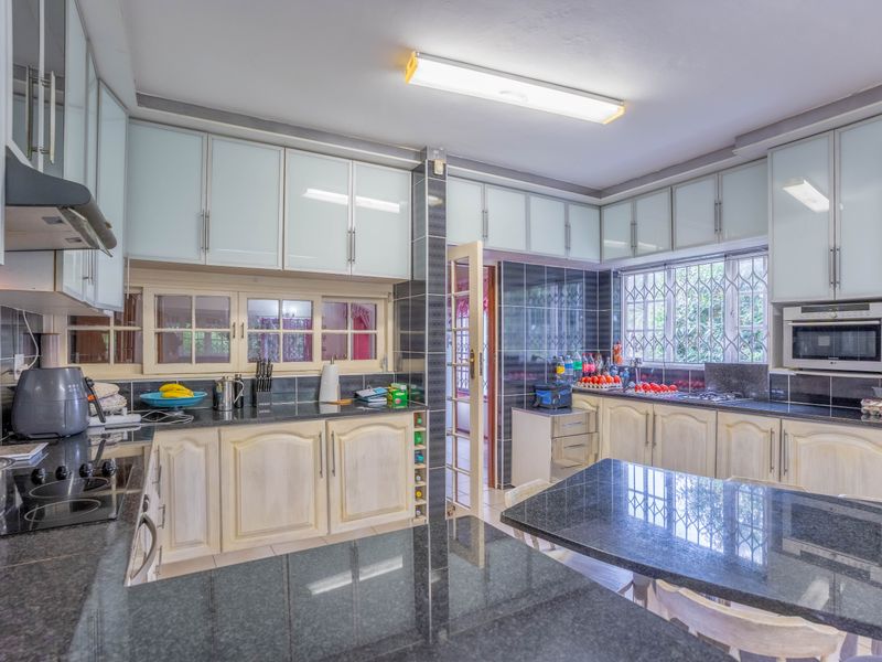 The epitome of modern living in this captivating family home! - Photo 8