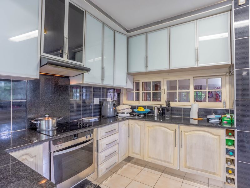 The epitome of modern living in this captivating family home! - Photo 6