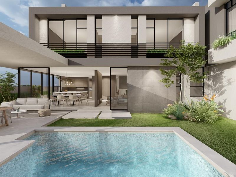 Modern double-story cluster home featuring a swimming pool, landscaped garden, and a spacious covered patio with seamless indoor-outdoor flow.