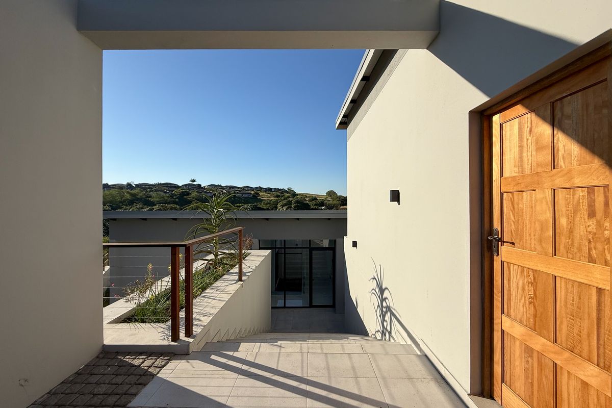 Modern 4-Bedroom Home in Palm Lakes Estate – Contemporary Living Surrounded by Nature - Photo 2