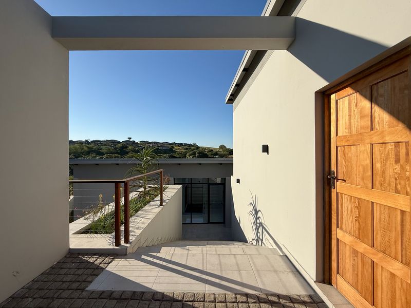 Modern 4-Bedroom Home in Palm Lakes Estate – Contemporary Living Surrounded by Nature - Photo 2