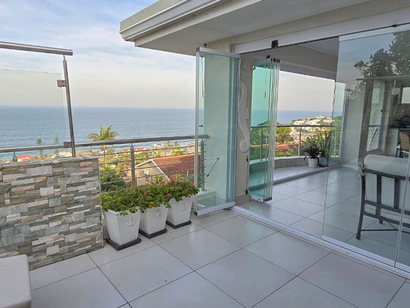 Seamless Indoor-Outdoor Living with Breathtaking Coastline Views - Photo 5