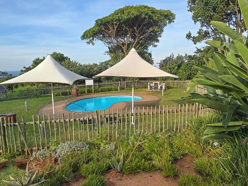 Seamless Indoor-Outdoor Living with Breathtaking Coastline Views - Photo 2