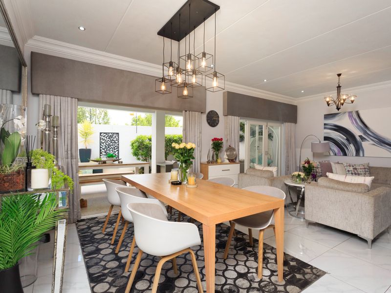 Elegant Triple-Storey Townhouse Offering Sophisticated Estate Living - Photo 1