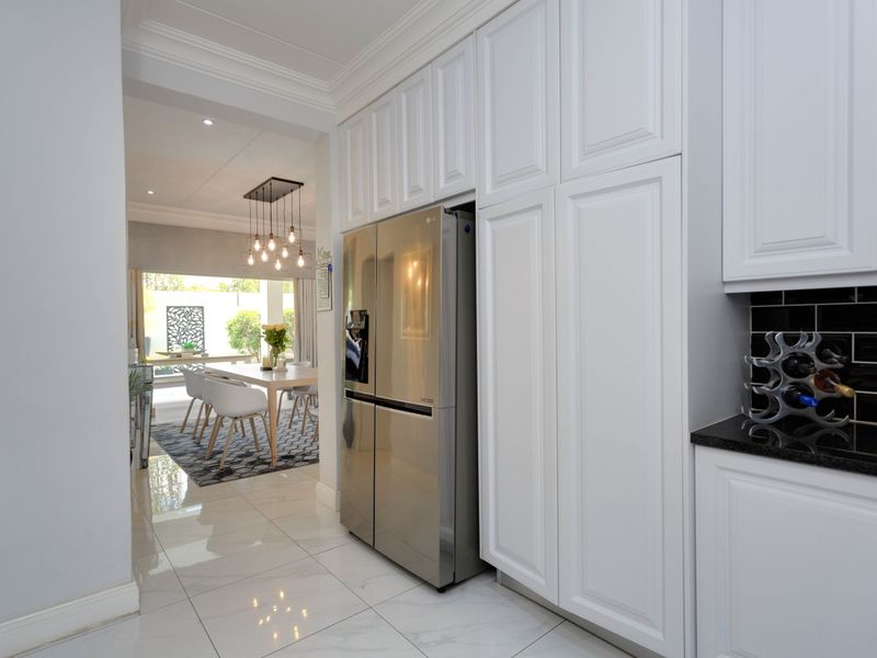 Elegant Triple-Storey Townhouse Offering Sophisticated Estate Living - Photo 5