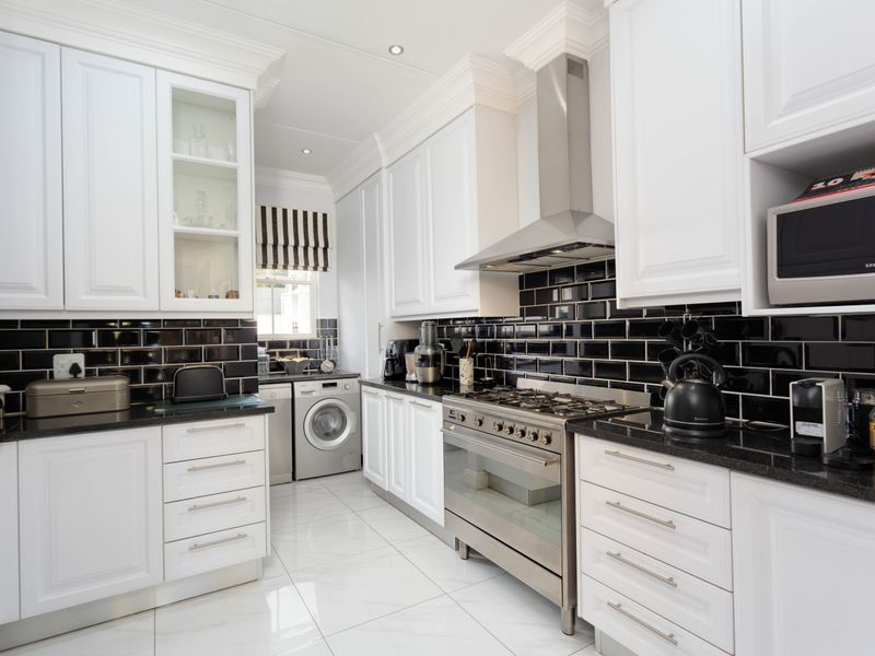 Elegant Triple-Storey Townhouse Offering Sophisticated Estate Living - Photo 4