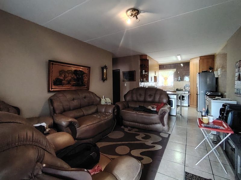 Sophisticated Ground-Floor Unit in Secure Complex with Pool and Pet-Friendly Appeal - Photo 4