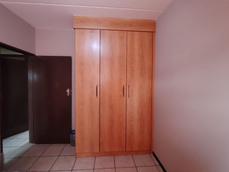 Sophisticated Ground-Floor Unit in Secure Complex with Pool and Pet-Friendly Appeal - Photo 10