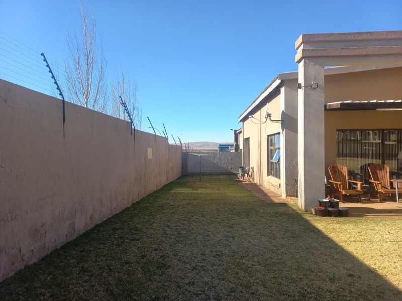 Charming Three-Bedroom Family Home in Bergsig – Space, Comfort & Security in One! - Photo 7