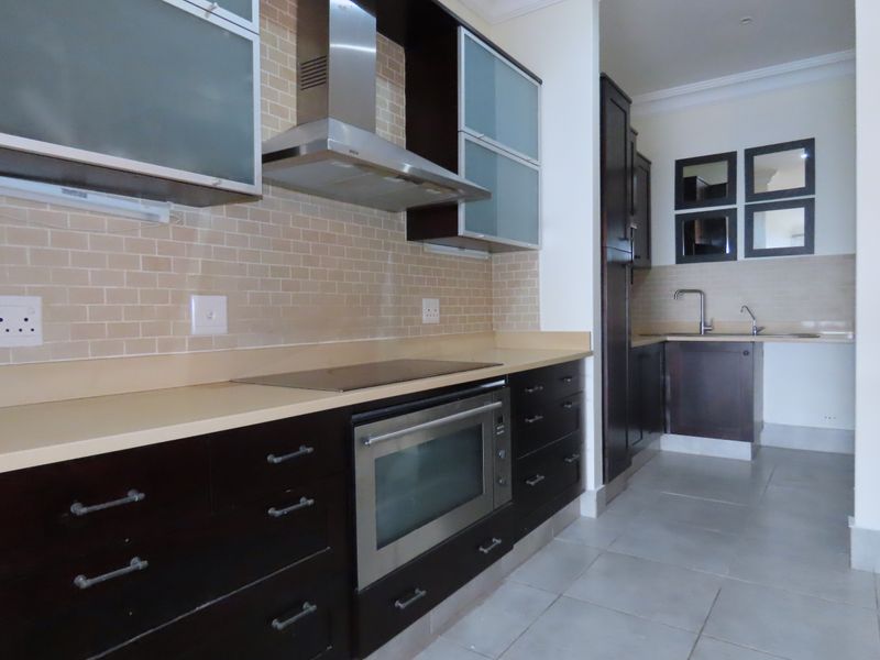 Exclusive Beachfront Elegance | 4-Bedroom Apartment with Breaker Views Overlooking Thompsons Bay - Photo 5