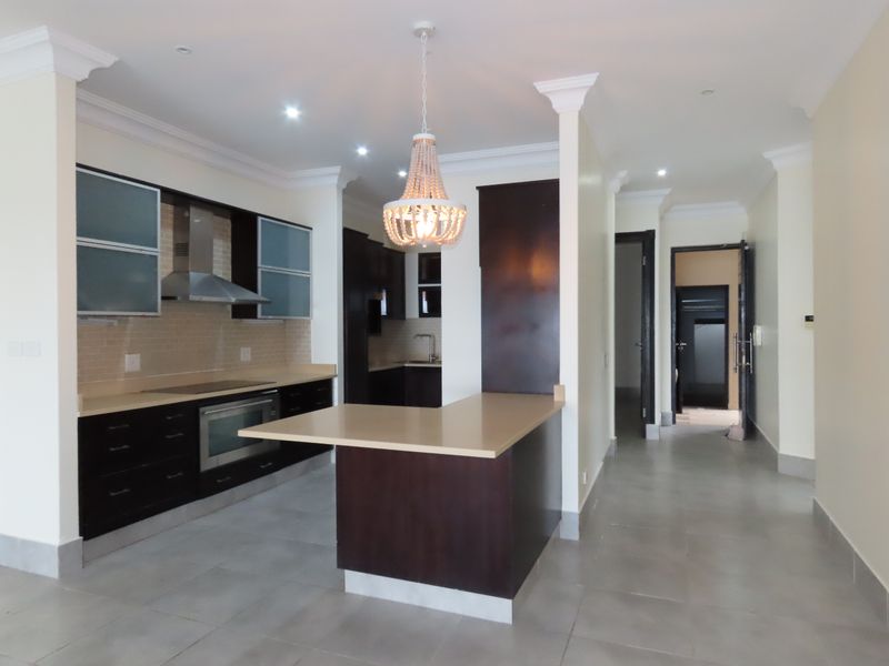 Exclusive Beachfront Elegance | 4-Bedroom Apartment with Breaker Views Overlooking Thompsons Bay - Photo 4