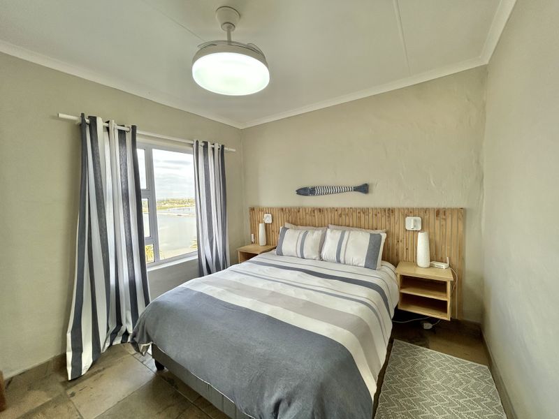 Perfect Holiday Escape with Breathtaking Lagoon & Ocean Views - Photo 10