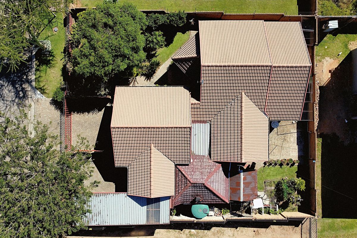 This stunning home nestled in a serene neighborhood - Photo 2