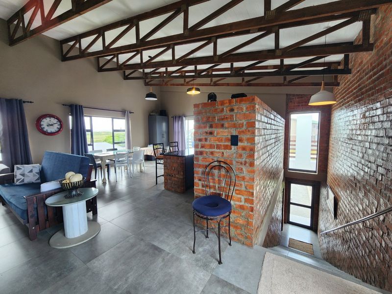 Modern Coastal Living with Scenic Views and Flexible Space - Photo 3