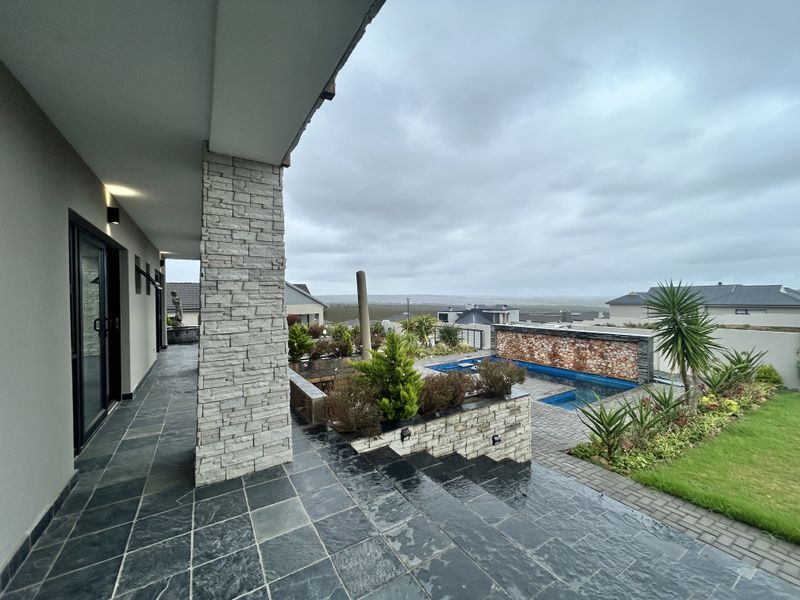Coastal Residence with Panoramic Views – Blue Waters Estate - Photo 2