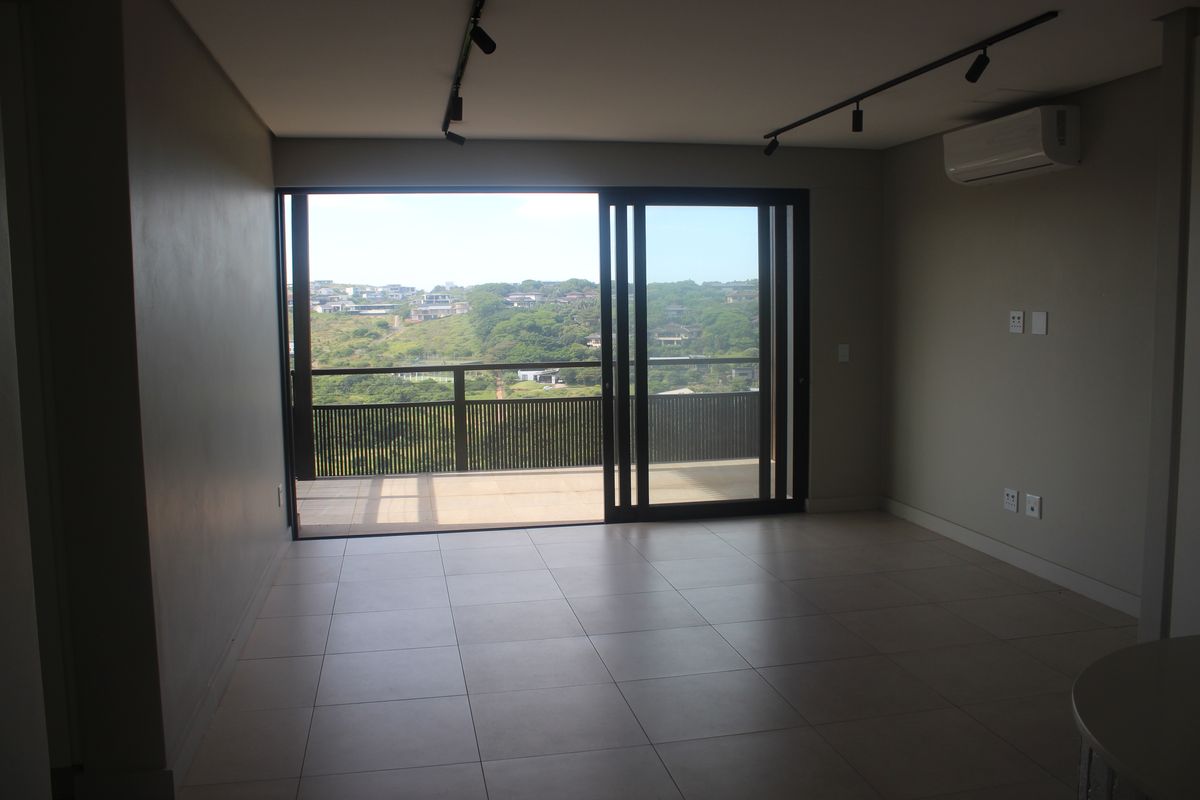 Sold‐Out Development – Exceptional Hilltop Resale with Uninterrupted Ocean & Wetland Views - Photo 4