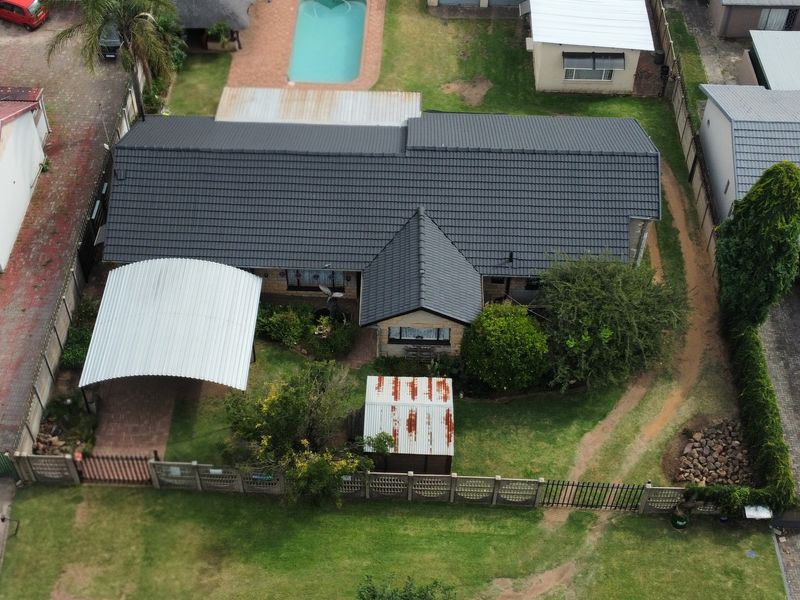 Discover a residence that masterfully balances expansive family living with high-yield investment po - Photo 3