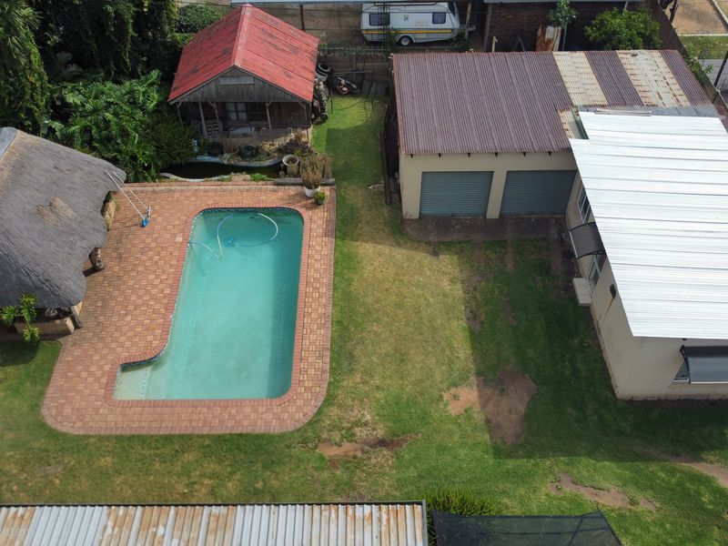 Discover a residence that masterfully balances expansive family living with high-yield investment po - Photo 6