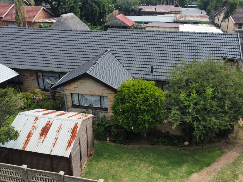 Discover a residence that masterfully balances expansive family living with high-yield investment po - Photo 4