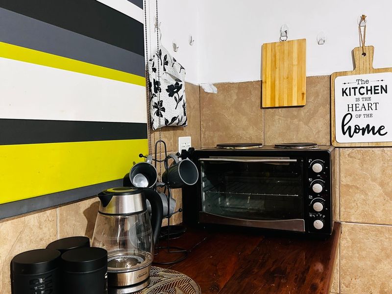 BEAUTIFUL FULLY FURNISHED GARDEN COTTAGE TO RENT IN VAALPARK - Photo 10