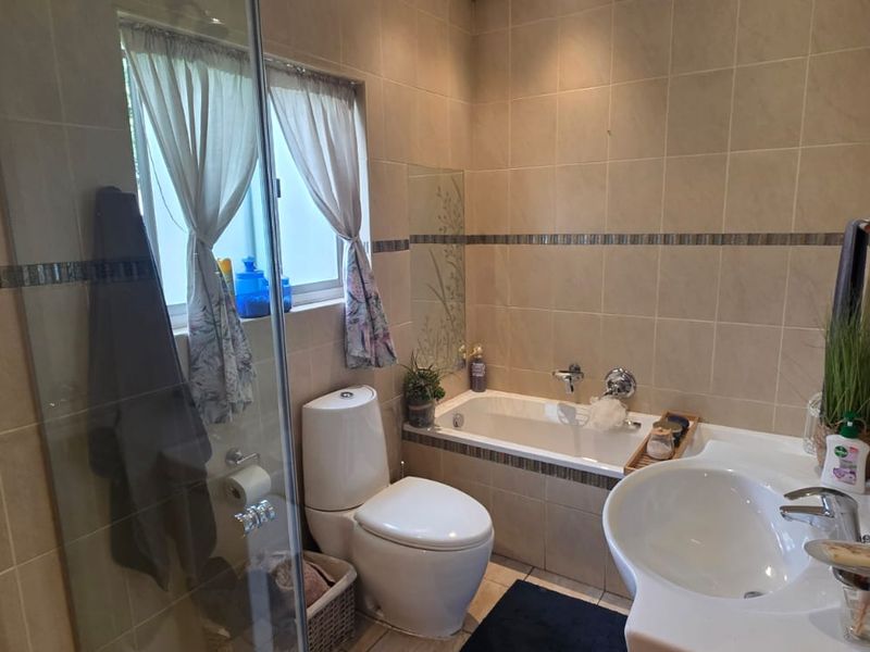 Stunning 4 Bedroom Family Home with Entertainment Features & Borehole - Photo 9