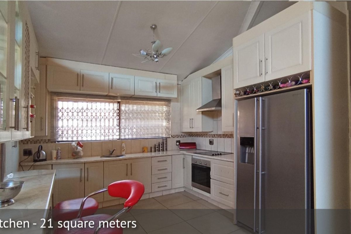 Elegant 4-Bedroom Family Home with Pool in The Orchards - Photo 5