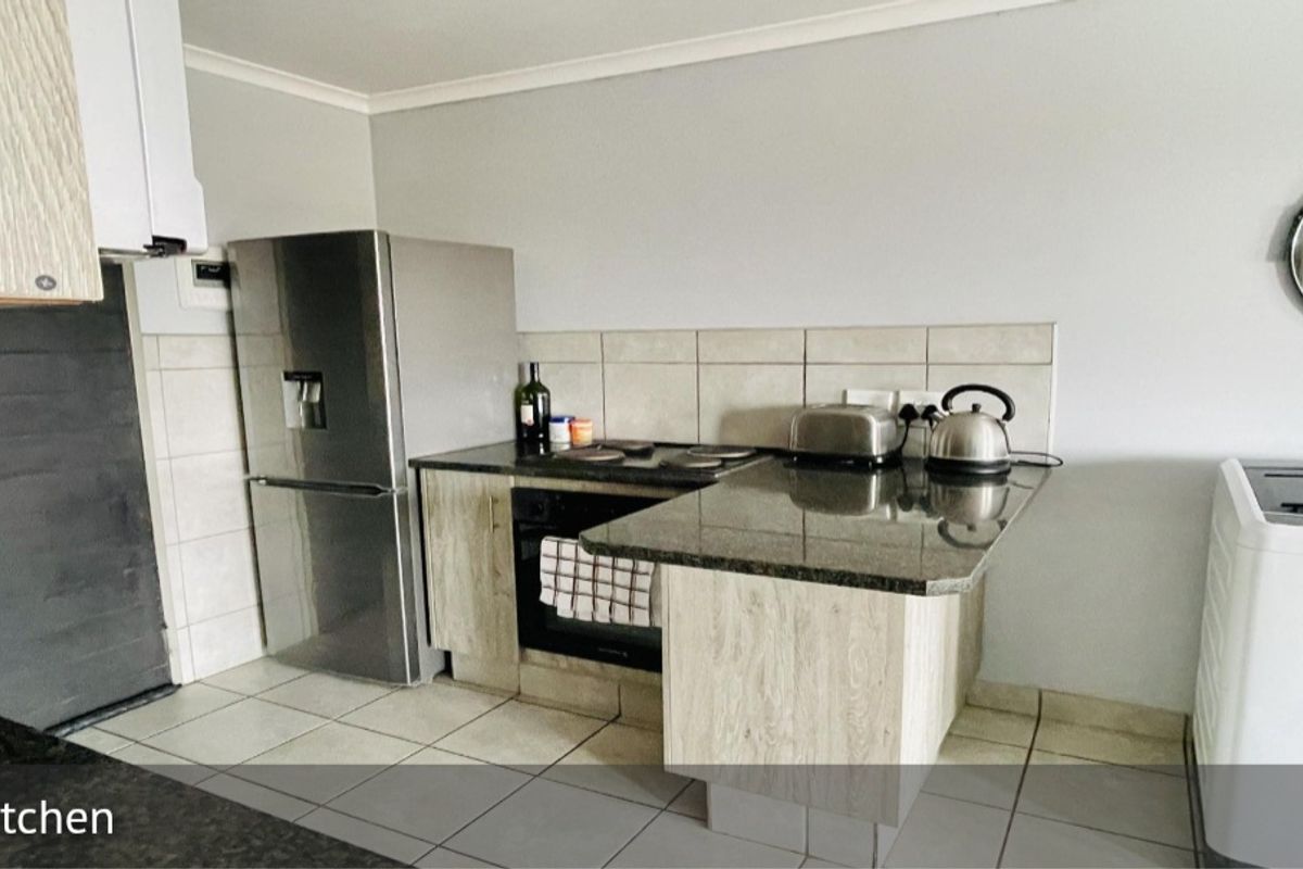 Showstopper Luxury: Modern 2-Bedroom Apartment with Scenic Balcony in Heuweloord - Photo 5