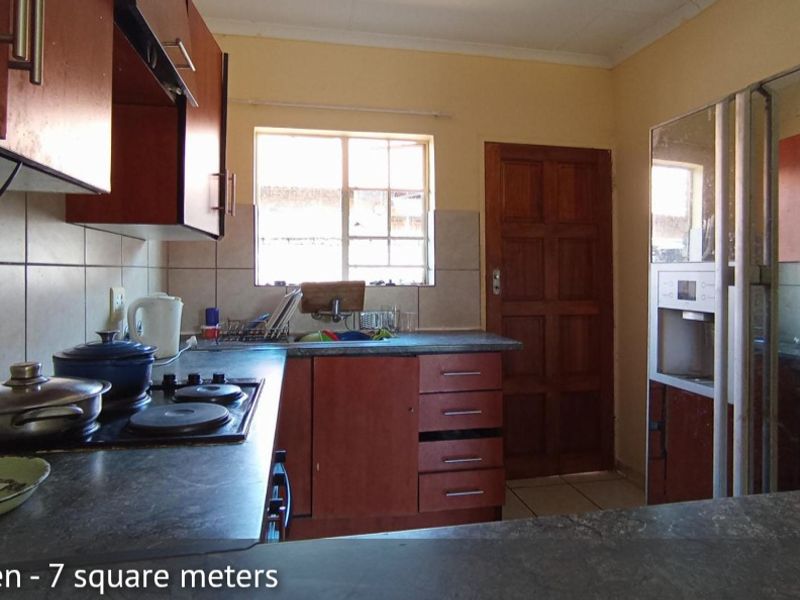 Timeless Face-Brick Architectural Masterpiece in The Orchards Estate - Photo 8