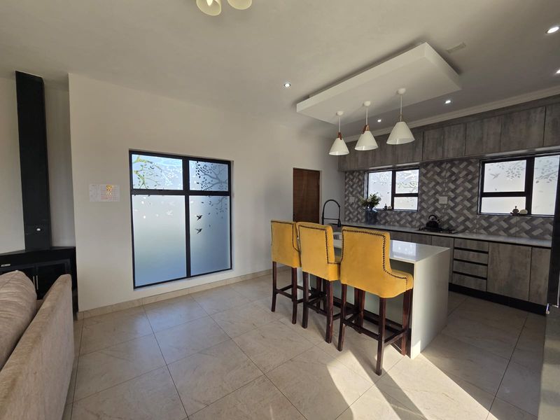 Luxury Architectural Statement Home with Panoramic Magaliesberg Views - Photo 8