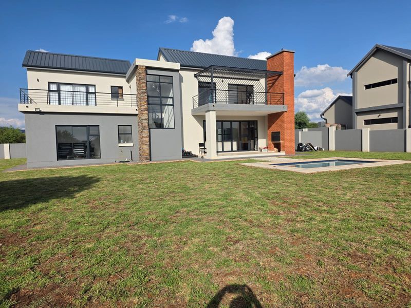 Luxury Architectural Statement Home with Panoramic Magaliesberg Views - Photo 3