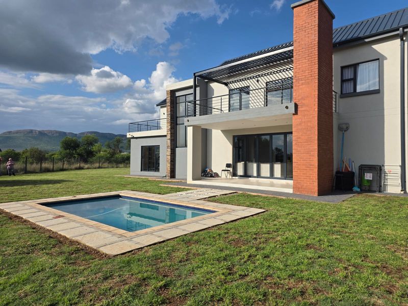 Luxury Architectural Statement Home with Panoramic Magaliesberg Views - Photo 2
