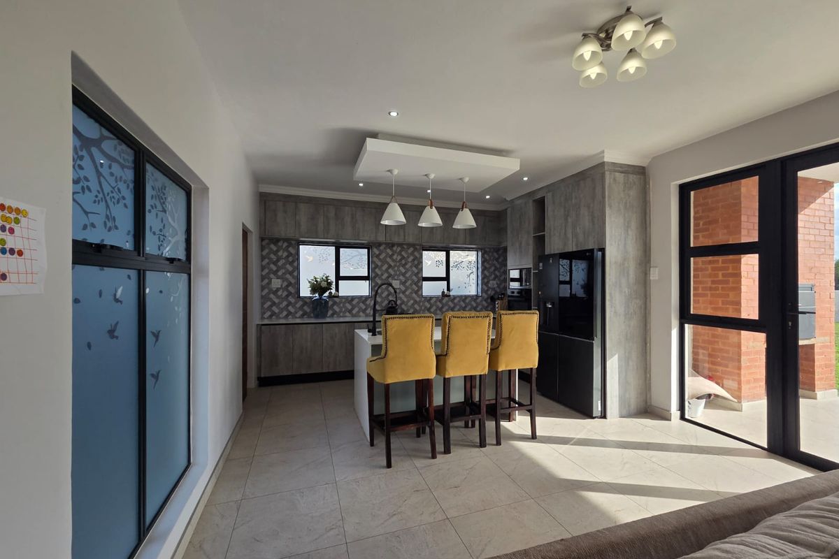 Luxury Architectural Statement Home with Panoramic Magaliesberg Views - Photo 5