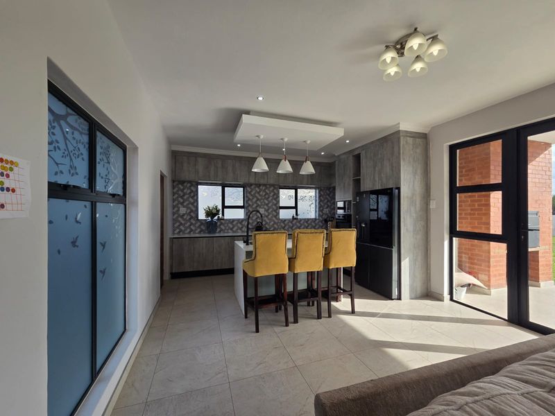 Luxury Architectural Statement Home with Panoramic Magaliesberg Views - Photo 5