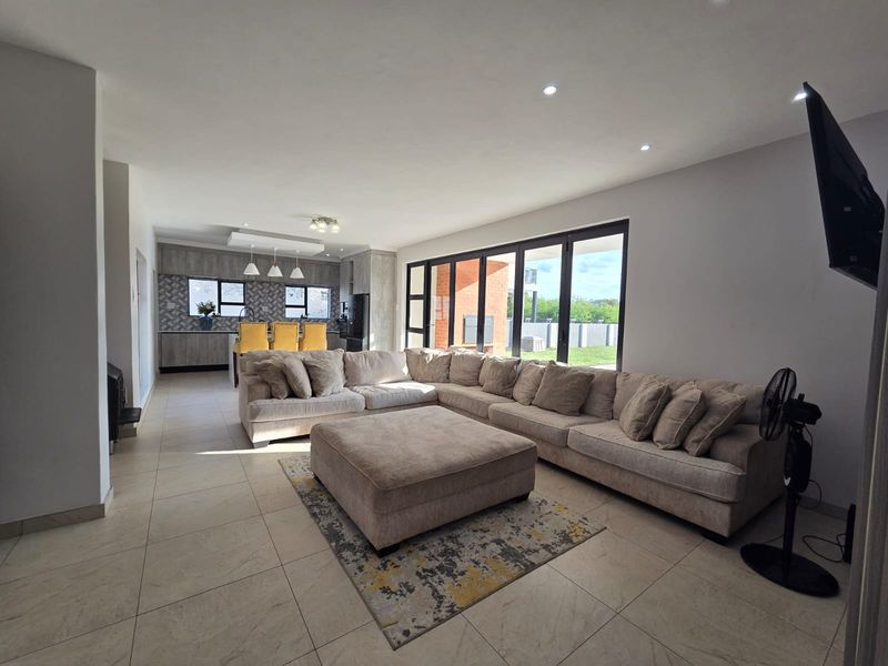 Luxury Architectural Statement Home with Panoramic Magaliesberg Views - Photo 10