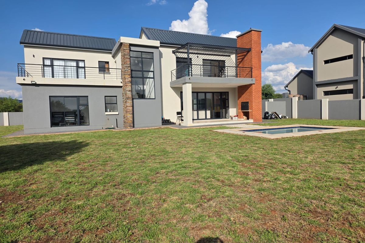 Luxury Architectural Statement Home with Panoramic Magaliesberg Views - Photo 2