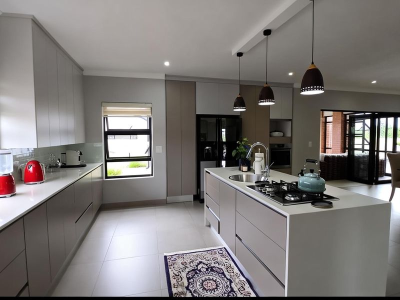 Elegant 4-Bedroom Luxury Home with Pool in La Camargue Estate - Photo 9