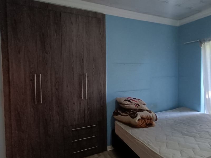 Investor’s Dream Near the University – Spacious 6 Bedroom Property on a Massive 1995sqm Stand! - Photo 9