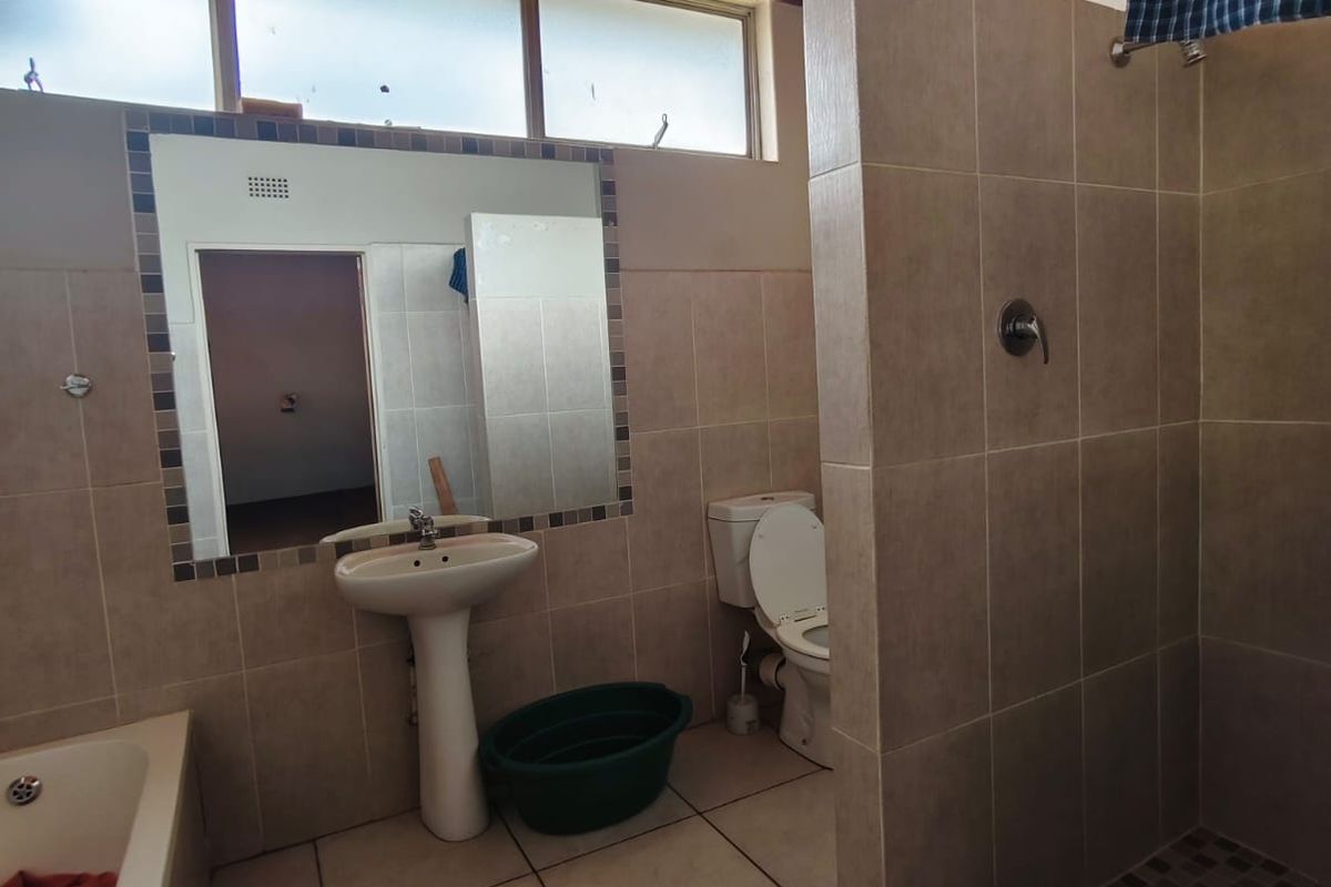 Investor’s Opportunity – Walking Distance to Flavius Mareka College! - Photo 2