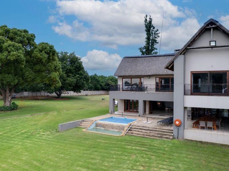 Exceptional Riverfront Estate with Luxury Living & Prime Development Potential - Photo 6