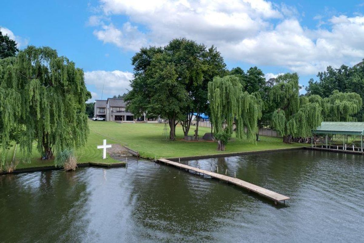 Exceptional Riverfront Estate with Luxury Living & Prime Development Potential - Photo 2