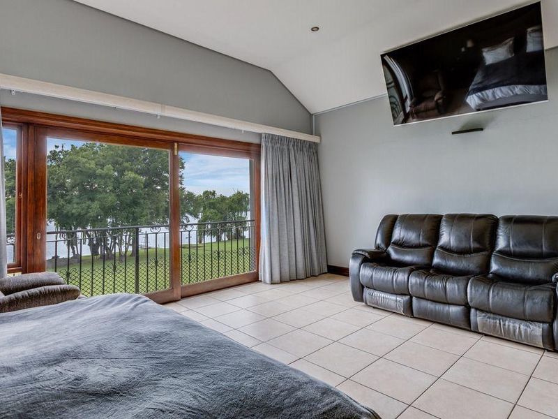 Exceptional Riverfront Estate with Luxury Living & Prime Development Potential - Photo 5