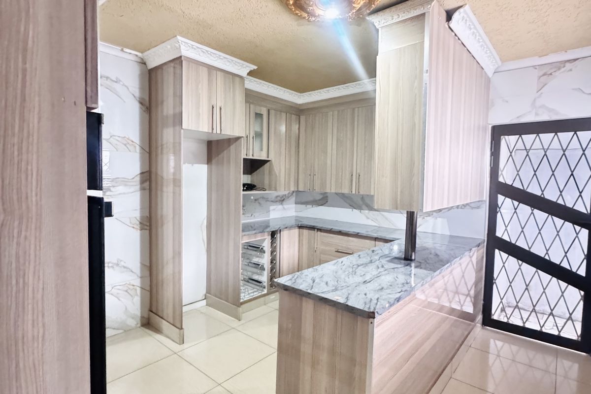 Spacious 7-Bedroom Modern Home with Style & Endless Potential - Photo 3