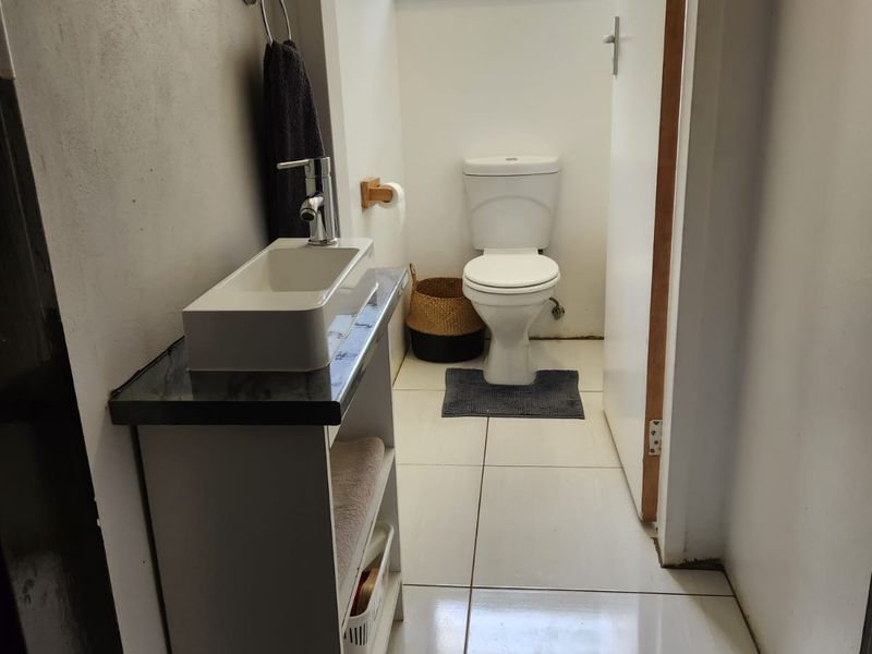 Spacious Dual-Wing Home with Income Generating Cottage and Solar in Sought-After Linden - Photo 9