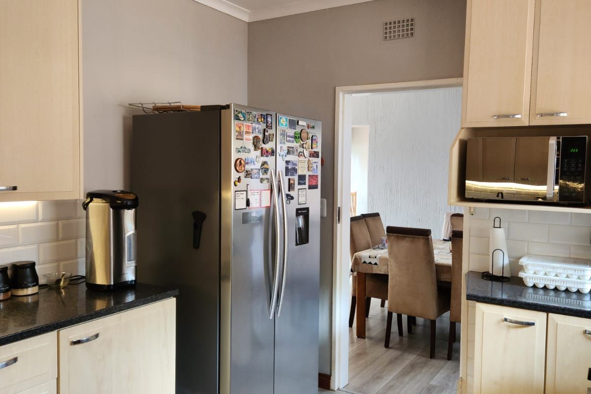 Spacious Dual-Wing Home with Income Generating Cottage and Solar in Sought-After Linden - Photo 3