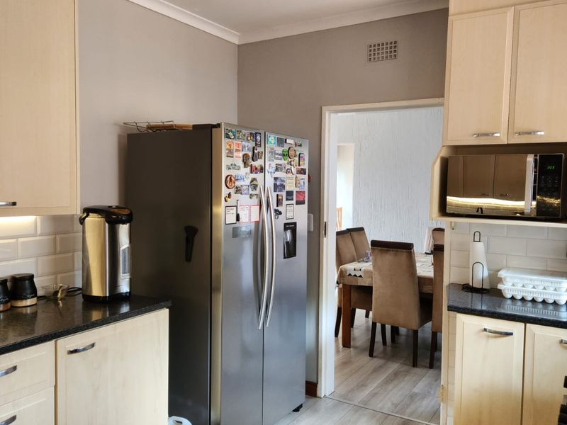 Spacious Dual-Wing Home with Income Generating Cottage and Solar in Sought-After Linden - Photo 3