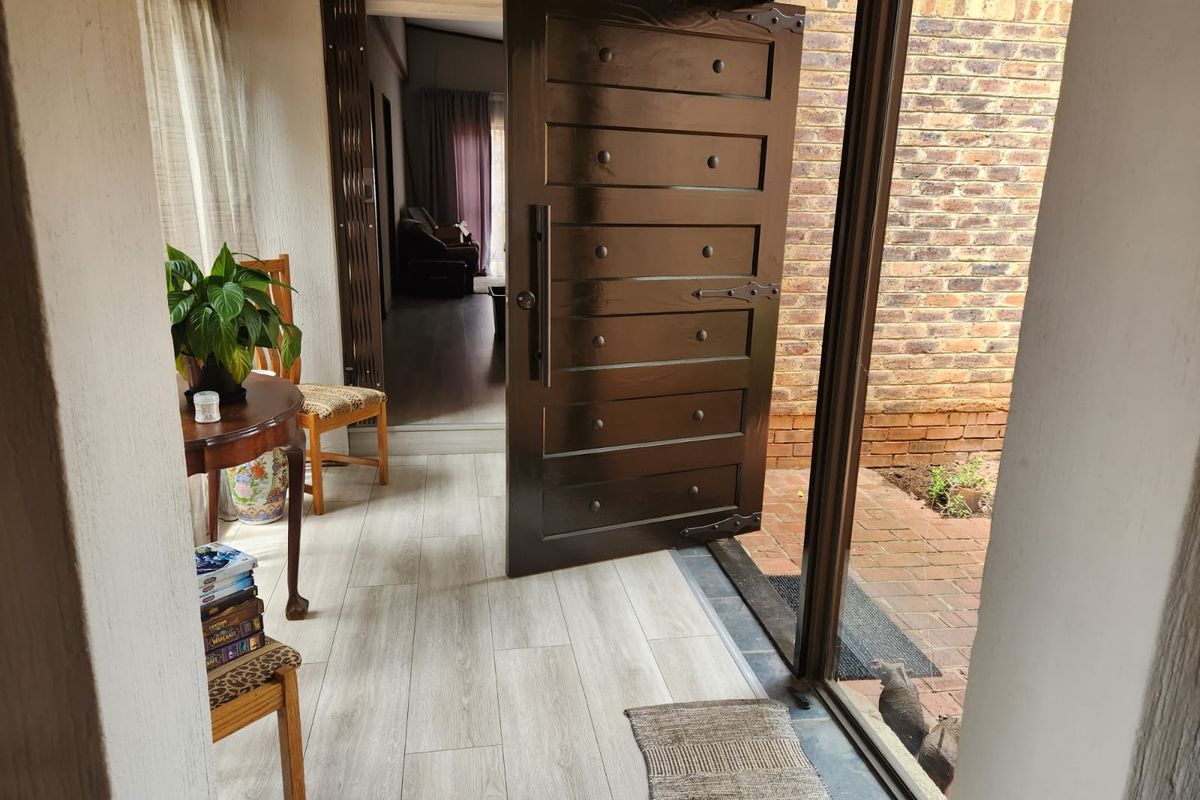 Spacious Dual-Wing Home with Income Generating Cottage and Solar in Sought-After Linden - Photo 2