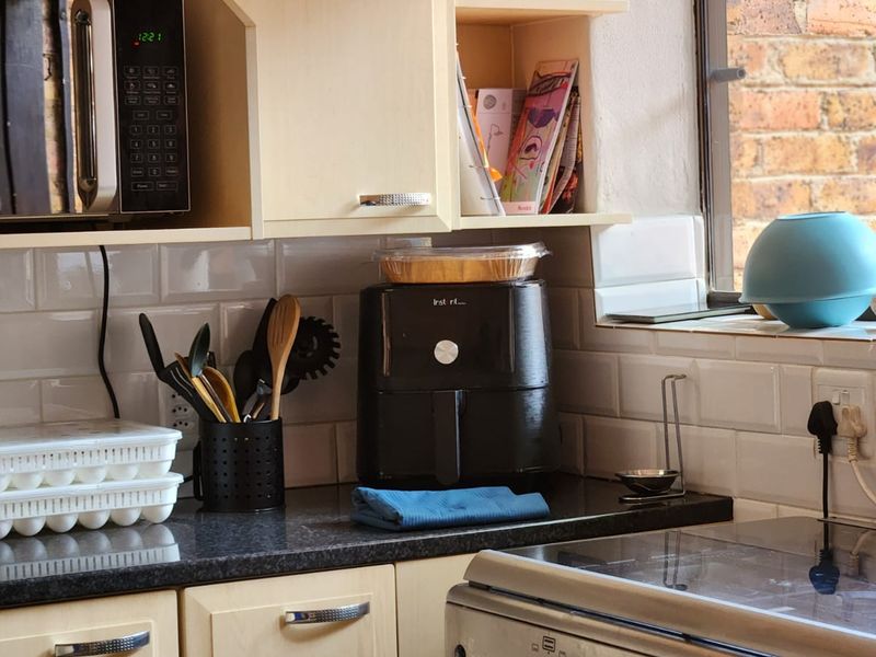 Spacious Dual-Wing Home with Income Generating Cottage and Solar in Sought-After Linden - Photo 5