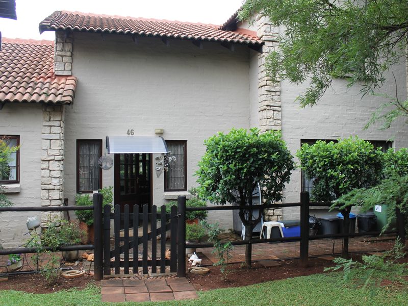 This beautifully positioned corner, freestanding townhouse in Olive Tree Cove. - Photo 2