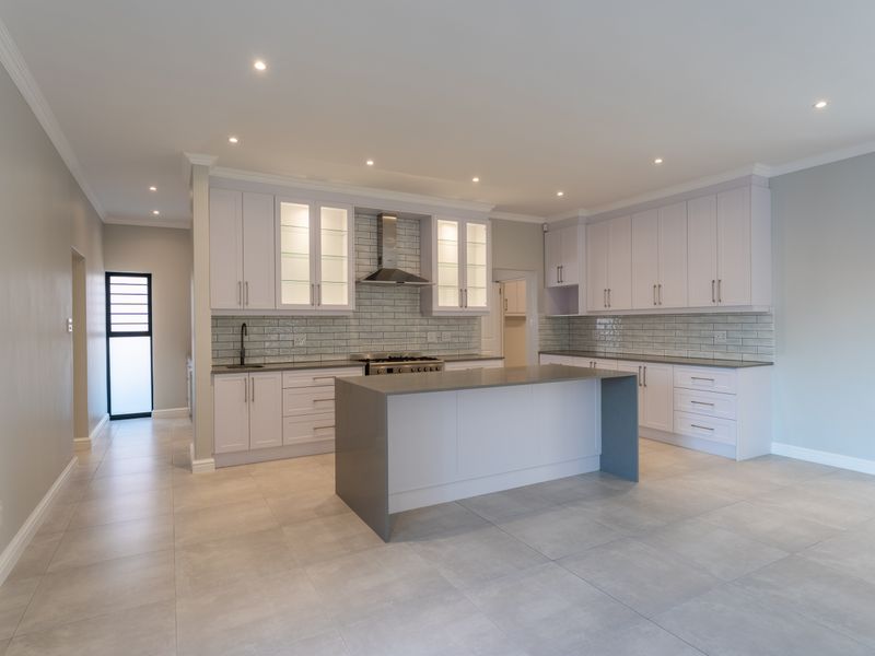 Stylish Newly Built Home with Modern Finishes & Greenbelt Views - Photo 4