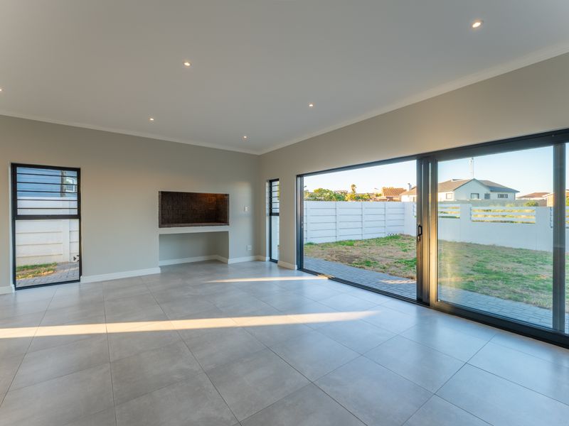 Stylish Newly Built Home with Modern Finishes & Greenbelt Views - Photo 9